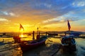 Traditionnal long tail boat at sunset Royalty Free Stock Photo