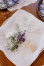 Traditions, symbols. Wedding tray with white napkin decorated with lavender, alcohol, baking Royalty Free Stock Photo