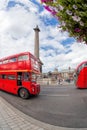 Trafalgal square with red buses in London, England Royalty Free Stock Photo