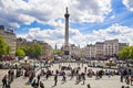 Trafalgar Square with lots of tourists Royalty Free Stock Photo