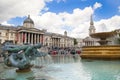 Trafalgar Square with lots of tourists Royalty Free Stock Photo