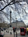 Trafalgar Square with Nelson Column London with red bus Royalty Free Stock Photo