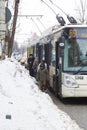 Passengers forced to walk on road after getting off the trolleybus because the local services didn't cleared the station of