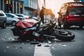 Traffic accident. Crashed motorcycle and car on city street Royalty Free Stock Photo