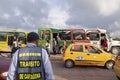 A traffic agent, buses and taxis, Cartagena de Indias, Colombia