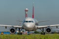 Traffic at the airport. Front view of the aircraft on the taxiway before takeoff