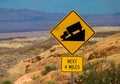 Traffic alerts downhill slope, mojave desert USA Royalty Free Stock Photo