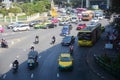 Traffic along a busy road at Victory Monument in Bangkok, Thailand : BANGKOK - January 17, 2019 Royalty Free Stock Photo