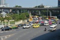 Traffic along a busy road at Victory Monument in Bangkok, Thailand : BANGKOK - January 17, 2019 Royalty Free Stock Photo