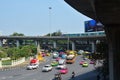 Traffic  along a busy road at Victory Monument in Bangkok, Thailand : BANGKOK - January 17, 2019 Royalty Free Stock Photo