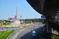 Traffic along a busy road at Victory Monument in Bangkok, Thailand : BANGKOK - January 17, 2019 Royalty Free Stock Photo