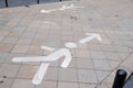 Traffic arrow direction sign for pedestrians in the pedestrian street in Bordeaux city France Concept of social distancing
