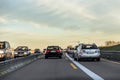 Traffic on the autobahn during sunset Royalty Free Stock Photo