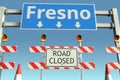 Traffic barricades near Fresno city traffic sign. Lockdown in the United States conceptual 3D rendering