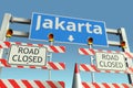 Traffic barricades near Jakarta city traffic sign. Coronavirus disease quarantine or lockdown in Indonesia conceptual 3D