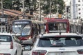 Traffic of buses, cars and pedestrians in Santo Amaro Avenue