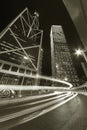Traffic in central district of Hong Kong city at night in monochrome Royalty Free Stock Photo