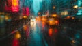 Traffic in the city at night with rain drops on the glass