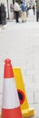 traffic cone with copy space and unrecognizable oof people Royalty Free Stock Photo