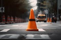 traffic cone in the middle of a crosswalk, warning pedestrians and drivers to stop