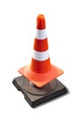 Traffic cone orange white pylon isolated on white background. Designation of a dangerous place on the road where work is being Royalty Free Stock Photo