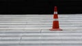 Traffic cone on pavement.