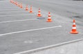 Traffic cone on the road. Closed car parking lot with white mark and traffic cone on street used warning sign on road Royalty Free Stock Photo