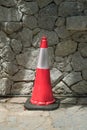 Traffic cone on sidewalk