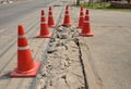 Traffic cone used on concrete pavement .