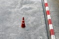 Traffic cones, Cement ground floor and plastic traffic cones red and white stripes is Safety equipment on the road