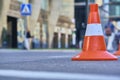 traffic cones stand on the asphalt color
