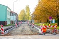 Traffic constraints during street repairs, warning signs