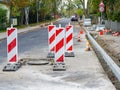 Traffic constraints during street repairs, warning signs