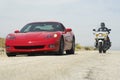 Traffic Cop Chasing Sports Car Royalty Free Stock Photo