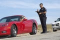 Traffic Cop Standing By Sports Car Royalty Free Stock Photo