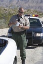 Traffic Cop Writing Ticket Royalty Free Stock Photo