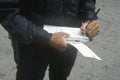 Traffic cop writing ticket, Santa Monica, California Royalty Free Stock Photo