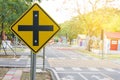 Traffic crossroads. A road sign warns of an intersection ahead. Royalty Free Stock Photo