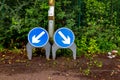 traffic direction sign blue sign with white direction arrows Royalty Free Stock Photo