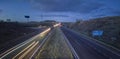 Traffic at dusk crossing the Autovia A-5, km 341