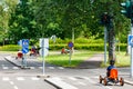 Traffic educational experience - practice park for children. Mini car road, traffic sign and traffic light