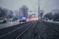 Traffic in the evening in the fog against the background of a prayer house in the city of Vinnitsa, Ukraine