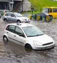 Traffic on flooded city road