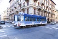 Traffic in a four ways junction with tram line