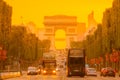 Traffic and Golden Sunset on the Champs Elysees in Paris