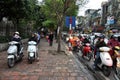 Traffic in Hanoi. Crowd of motorbike drivers on the street Royalty Free Stock Photo