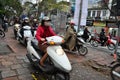 Traffic in Hanoi. Crowd of motorbike drivers on the street Royalty Free Stock Photo