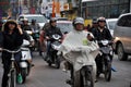 Traffic in Hanoi. Crowd of motorbike drivers on the street Royalty Free Stock Photo