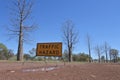 Traffic hazard road sign on a dirt road in Australia Royalty Free Stock Photo