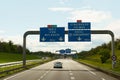 Traffic on the highway, information signs on a blue background